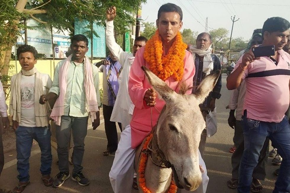 Politician Charged With Animal Cruelty After Donkey Ride In Indian State Of Bihar