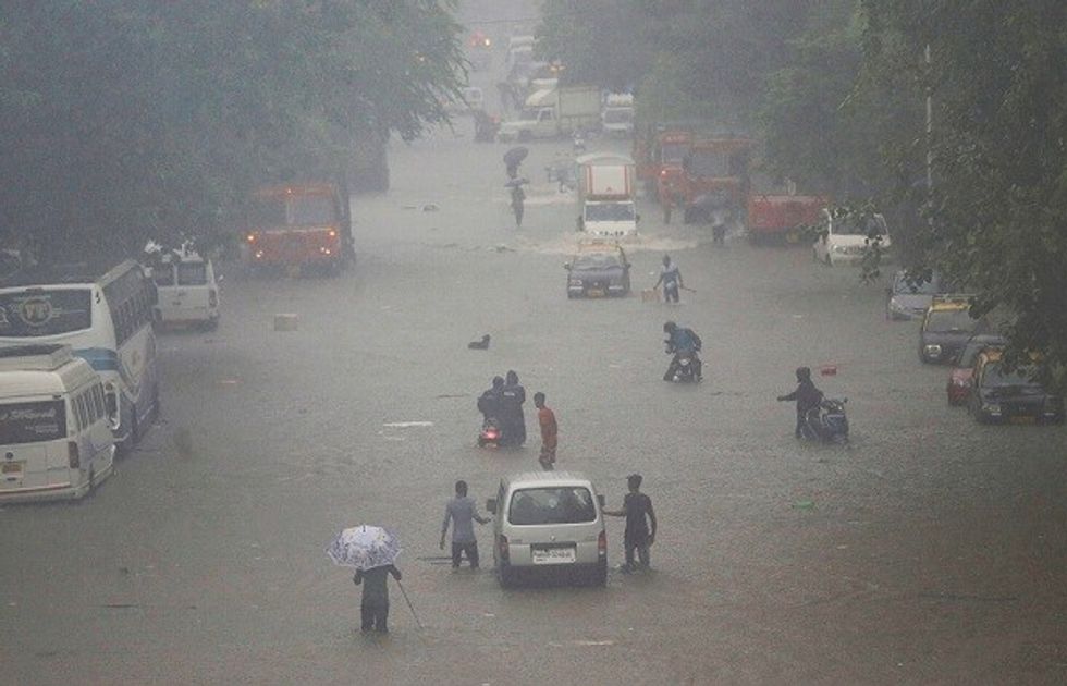 Heavy Rains Cause Commuter Chaos In Mumbai
