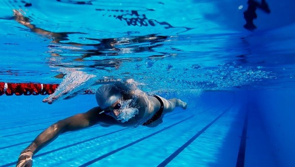 Swimming Coach Sacked For Alleged Molestation
