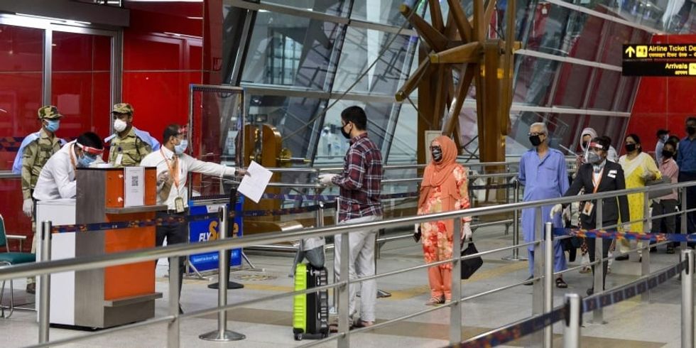 Consider imposing fines on passengers not wearing masks properly: DGCA to airports