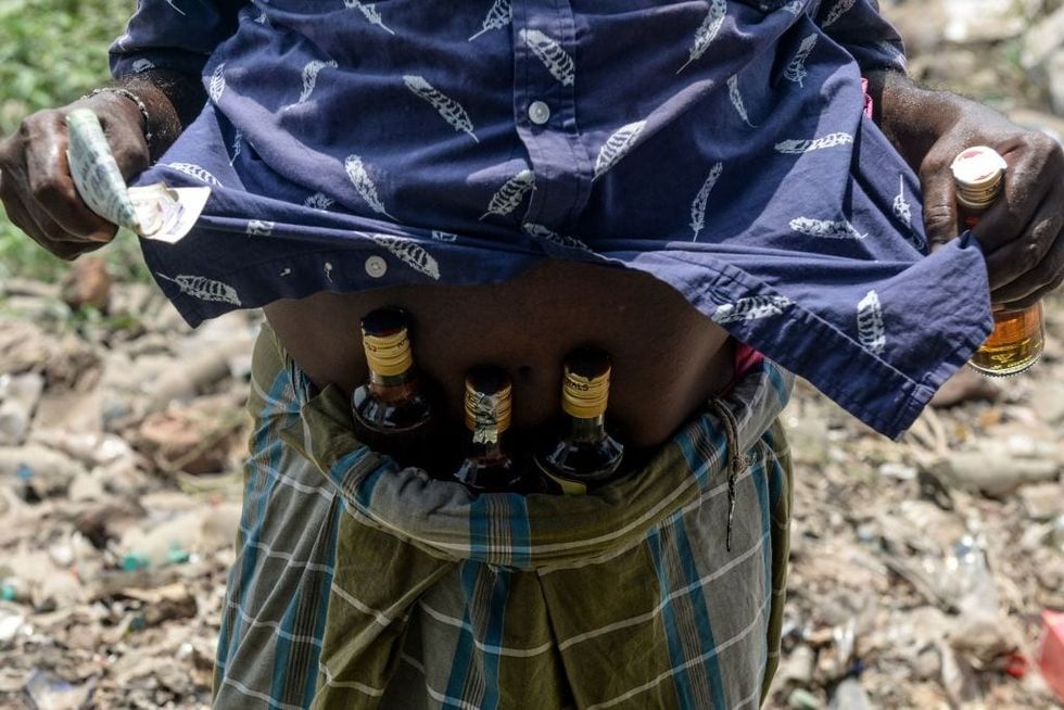 In India's Tamil Nadu, 37 die after consuming toxic liquor