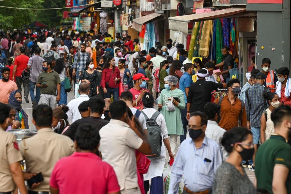 Indians rush to malls and markets as the country reopens