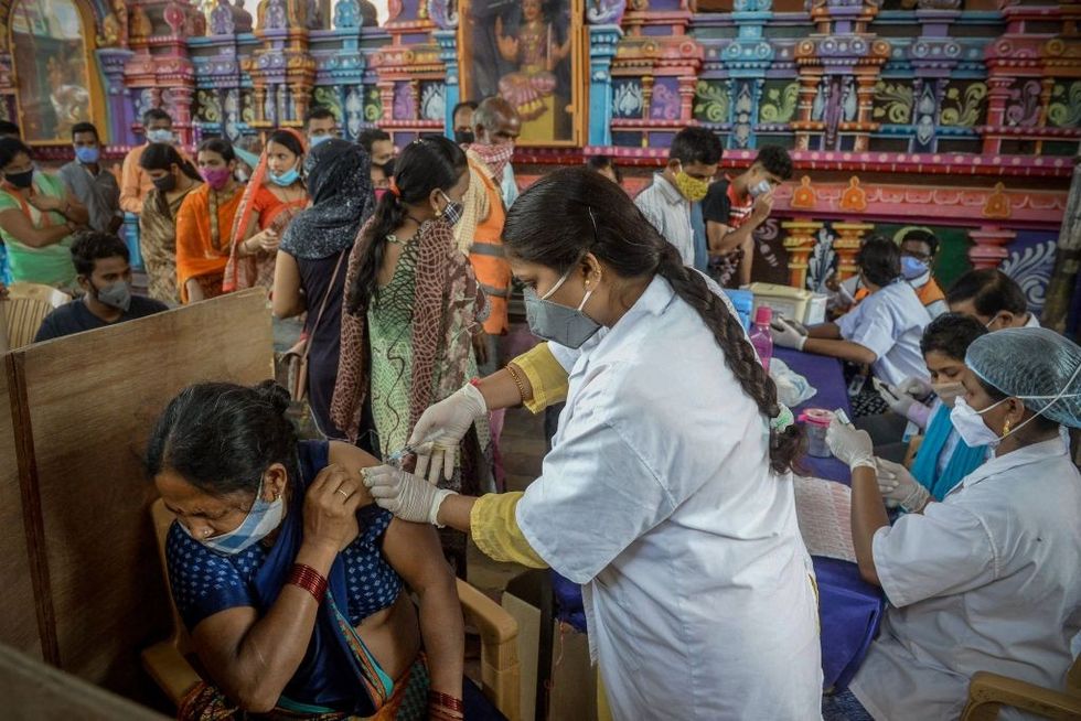 India's total Covid-19 cases at 30.13m, reports 393,310 deaths