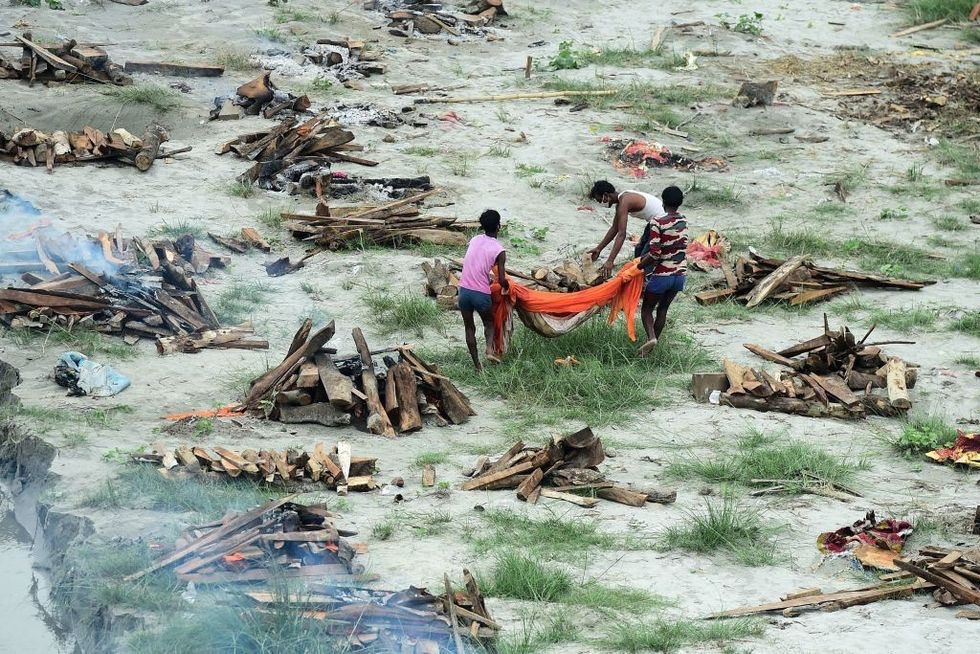 More corpses wash up on the banks of India's Ganges