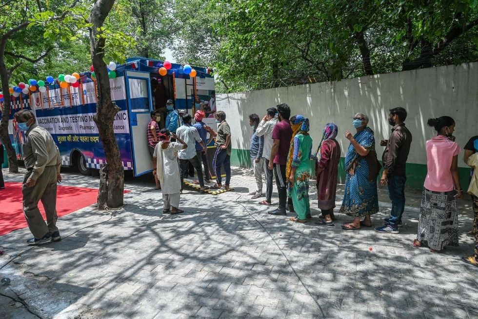 India reports 48,698 new Covid-19 cases, 1,183 deaths