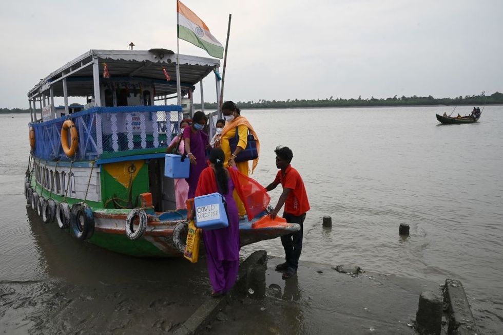 Vaccines arrive on boats in India's remote Sunderbans