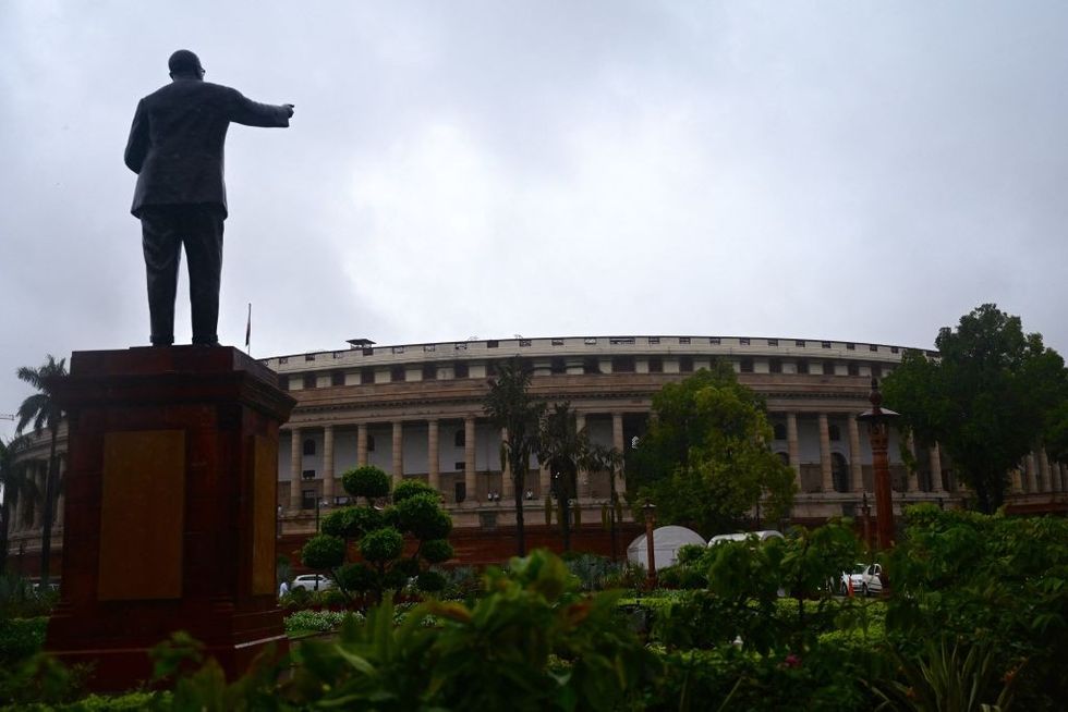 Pegasus: Opposition member snatches, tears India IT minister statement