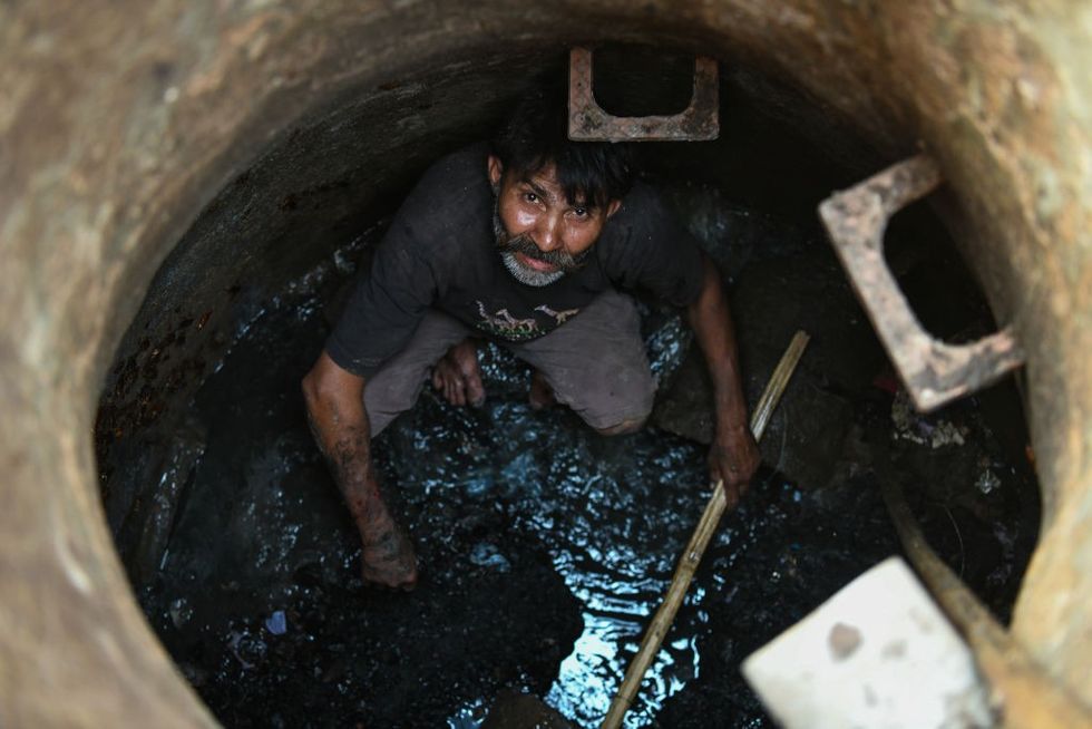 Modi government says no manual scavenging deaths in India, slammed