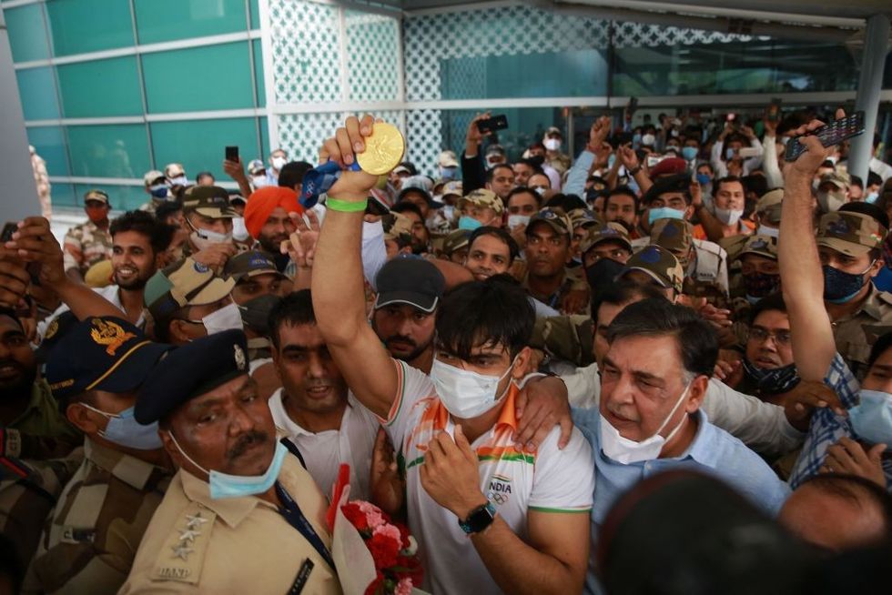 Indian Olympians return home; frenzy, chaos at airport