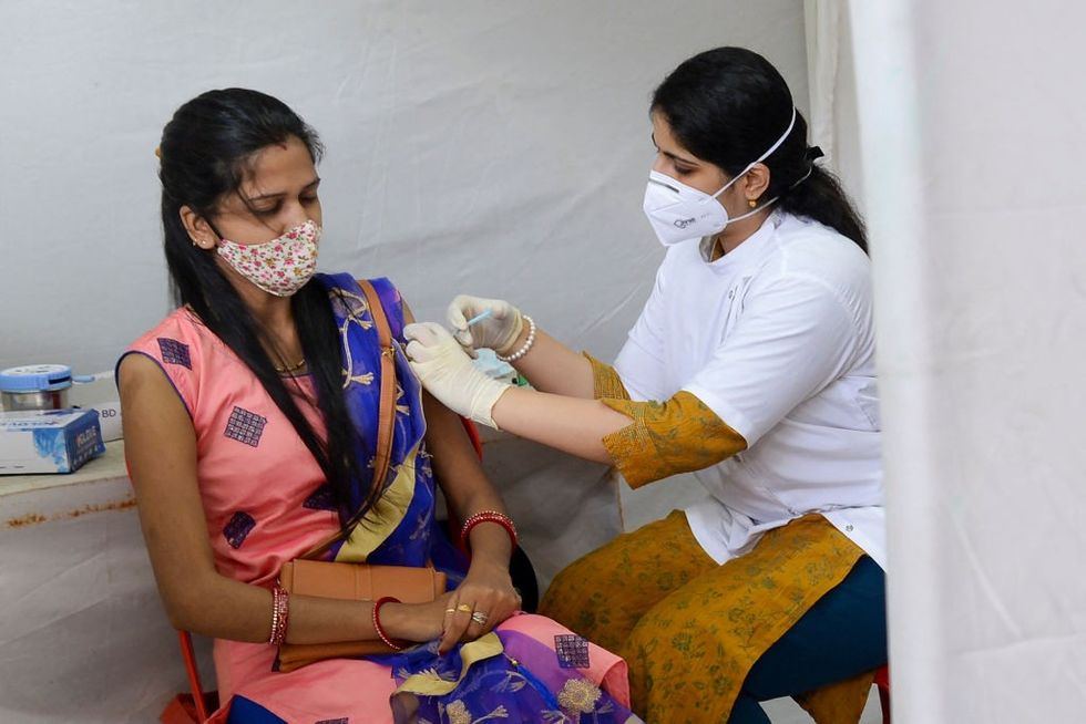 India delivers 750m Covid vaccines, health minister hails Modi