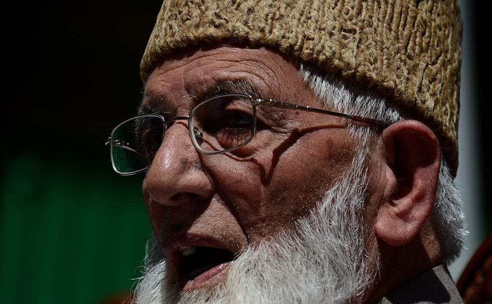 Late Kashmir separatist leader's kin charged under anti-terror law