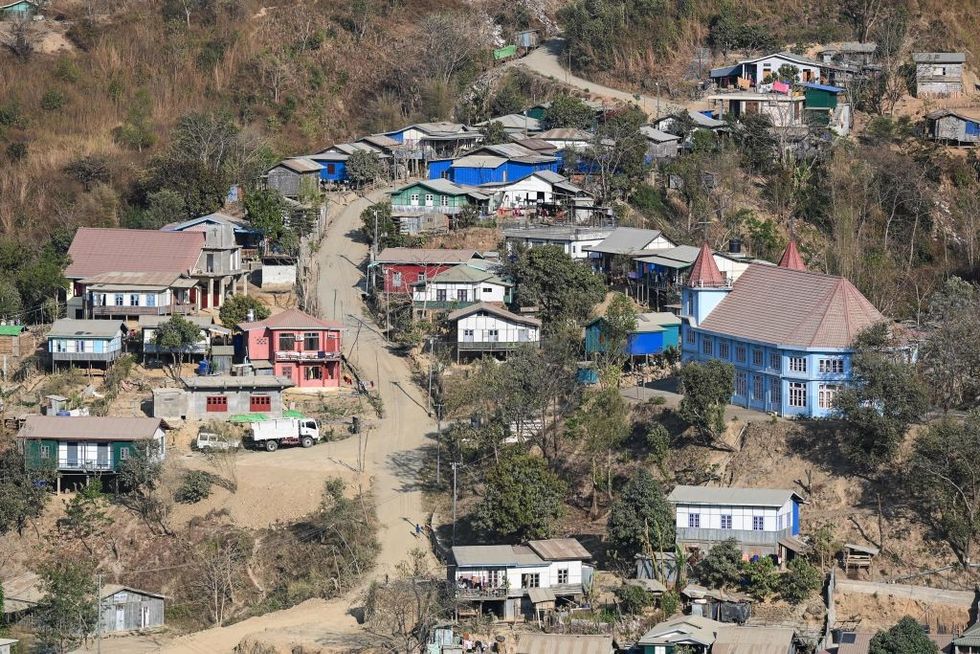 Myanmar clashes: Thousands flee to India