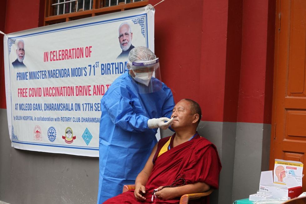 Indian man fined for asking why Modi's face is in vaccine drive