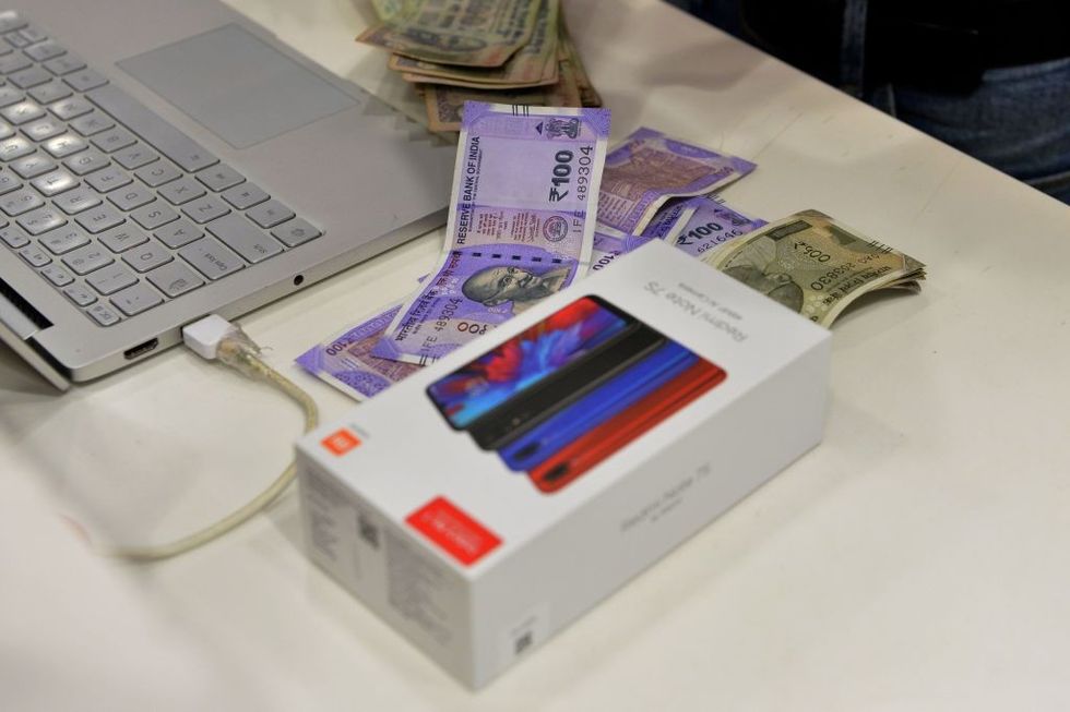 Indian I-T dept raids entities linked to Chinese mobile-phone makers