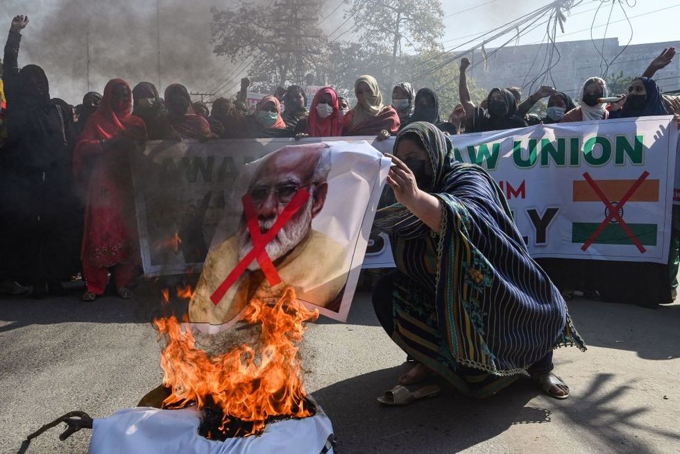 Pakistan women protest over India hijab row