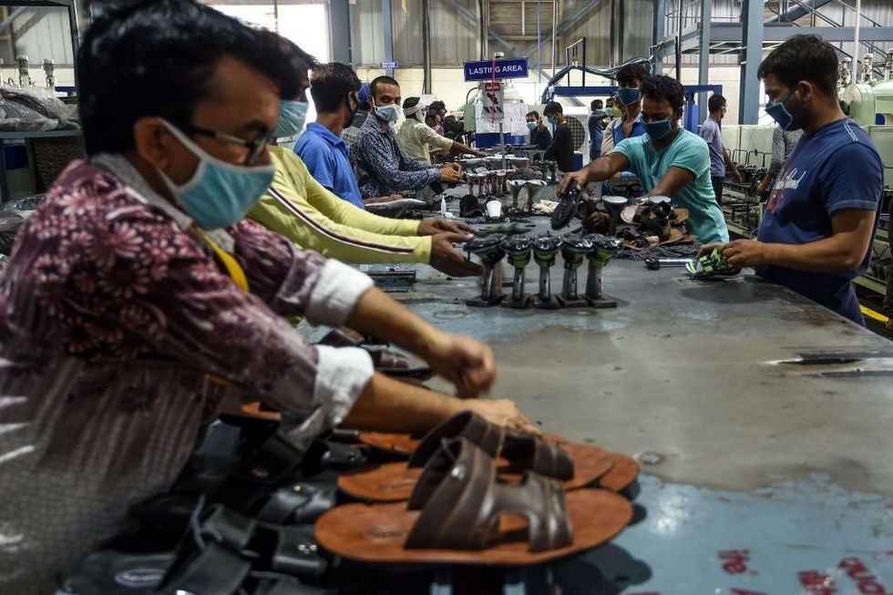 Factories in India's ancient shoe capital squeezed by costs, falling demand