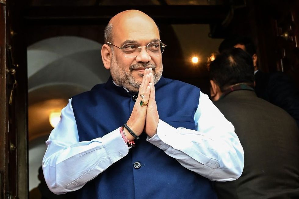 Gujarat cops arrest filmmaker for sharing photo of Amit Shah with tainted IAS officer
