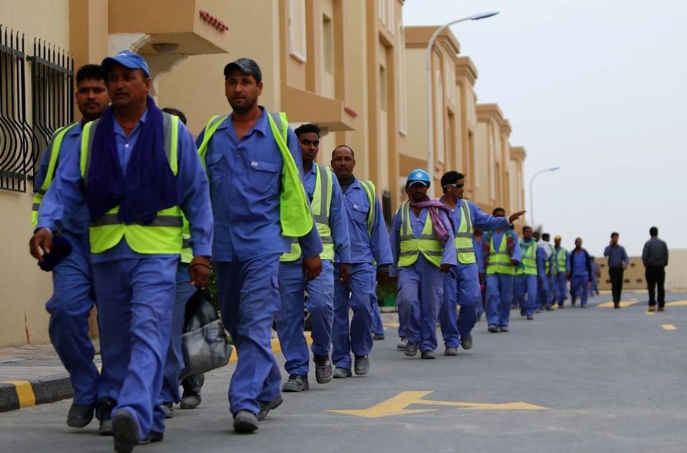 Ahead of football World Cup, Qatar 'red cards' migrant workers protesting over lack of pay