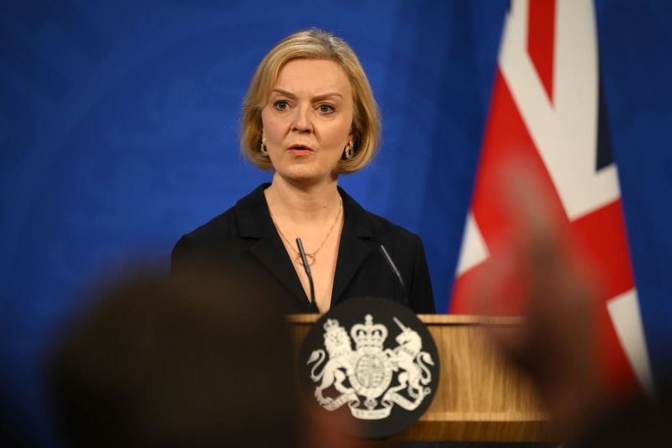 Booed by MPs, British PM Truss says she's a fighter, not quitter