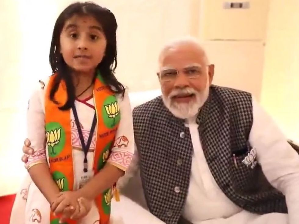 Major row erupts after minor girl 'campaigns' for BJP in Modi's presence in Gujarat