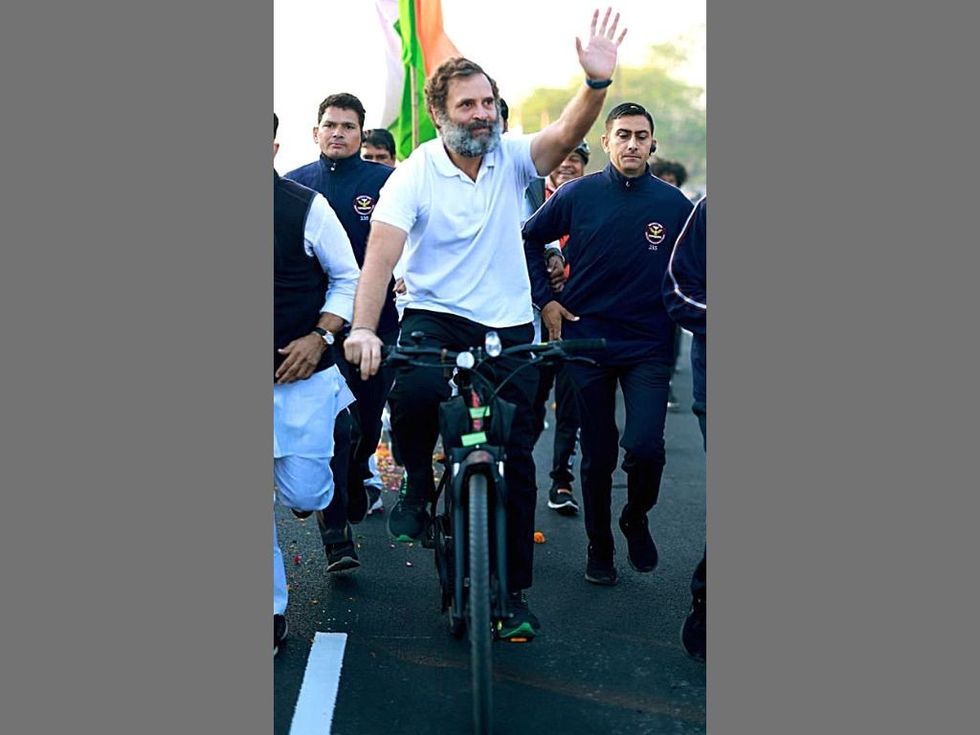 Rahul Gandhi seen riding bicycle briefly as Bharat Jodo Yatra continues in Madhya Pradesh