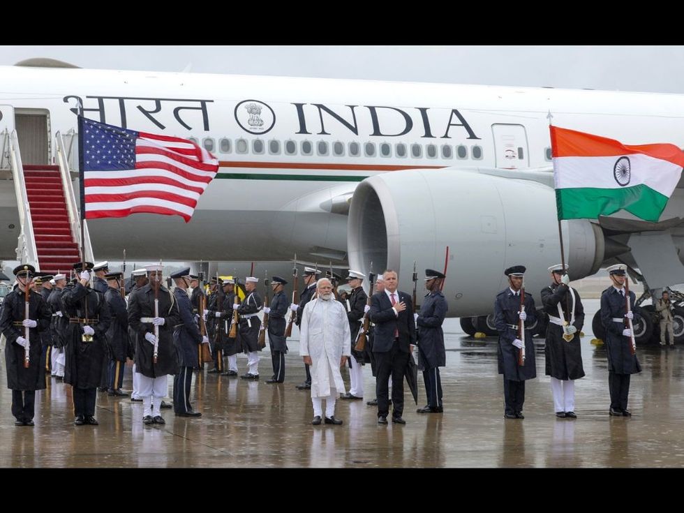 Party, netizens hail Modi's patriotic spirit as India PM braves rain for National Anthem in Washington DC