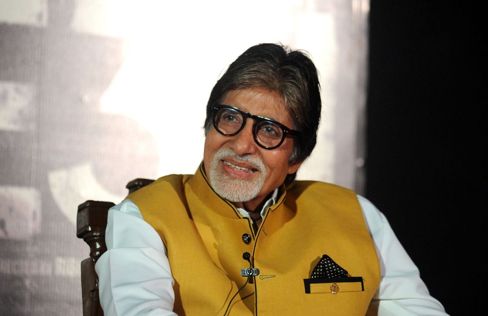 Big B greets fans with grandson Agastya