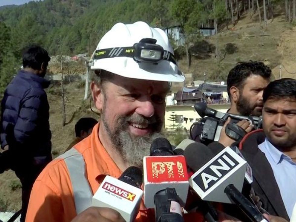 After technology gives in, India to manually dig tunnel to free trapped workers
