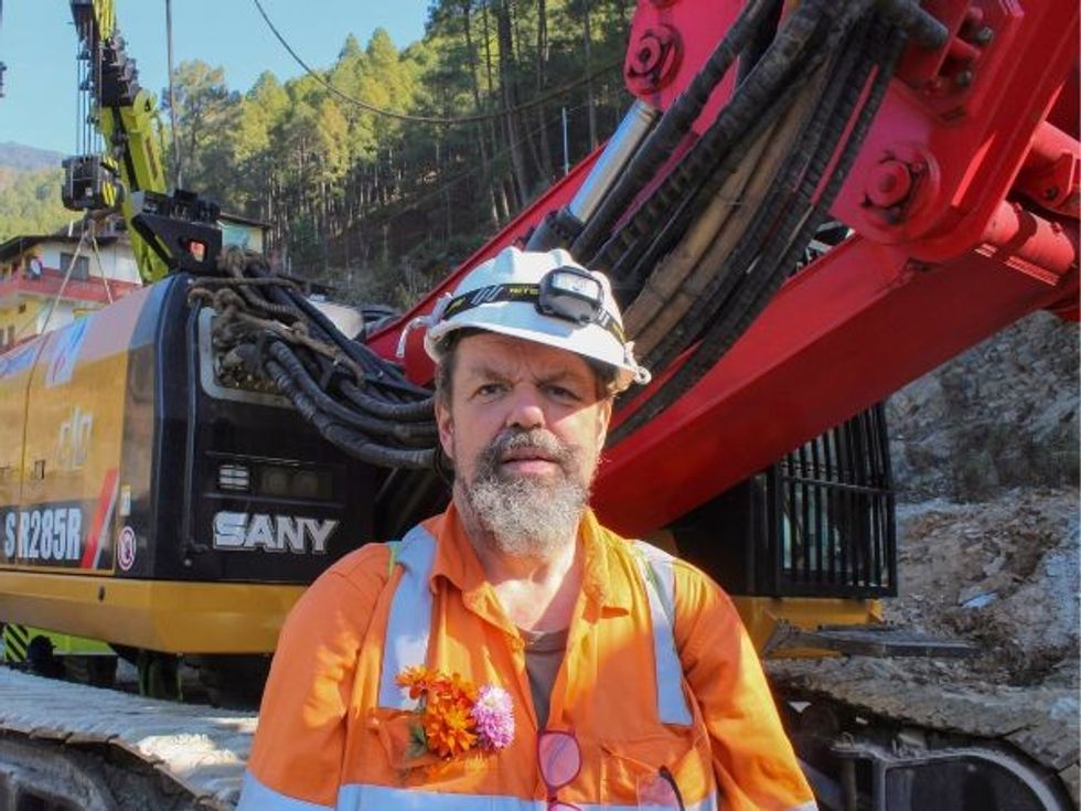 Tunnel expert Arnold Dix, who promised trapped workers' families their homecoming, 'over the moon' after mission success