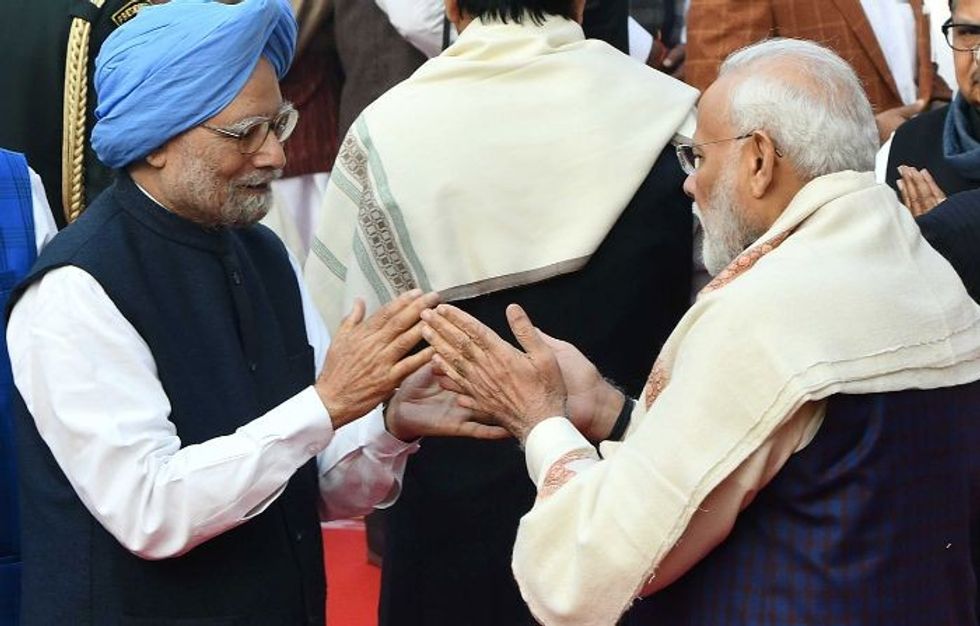 Modi praises ex-PM Manmohan Singh for attending parliament voting in wheelchair
