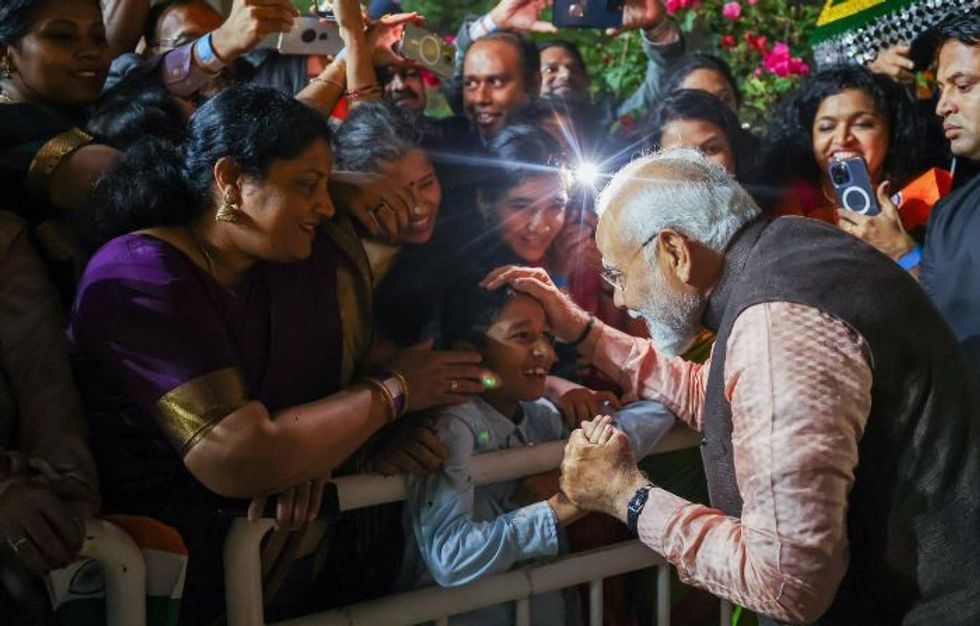 Modi in Qatar after Doha freed 8 Indian nationals; meets top leaders, diaspora