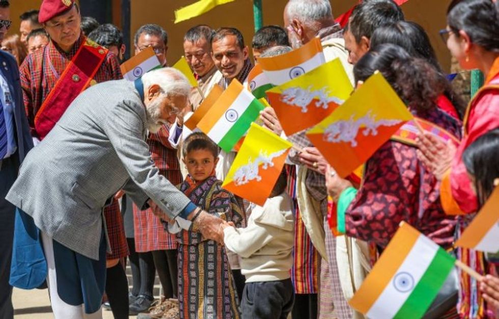 In Bhutan, Modi greeted with 'Garba' dance; called 'elder brother' by PM