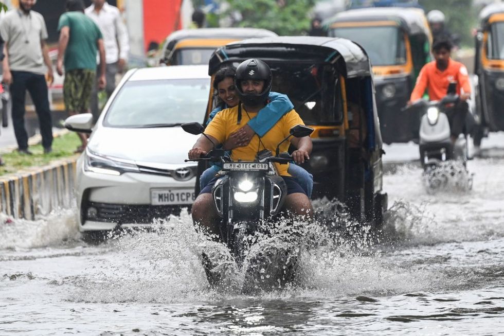 More than 50 flights cancelled as heavy rains lash Mumbai; train services hit