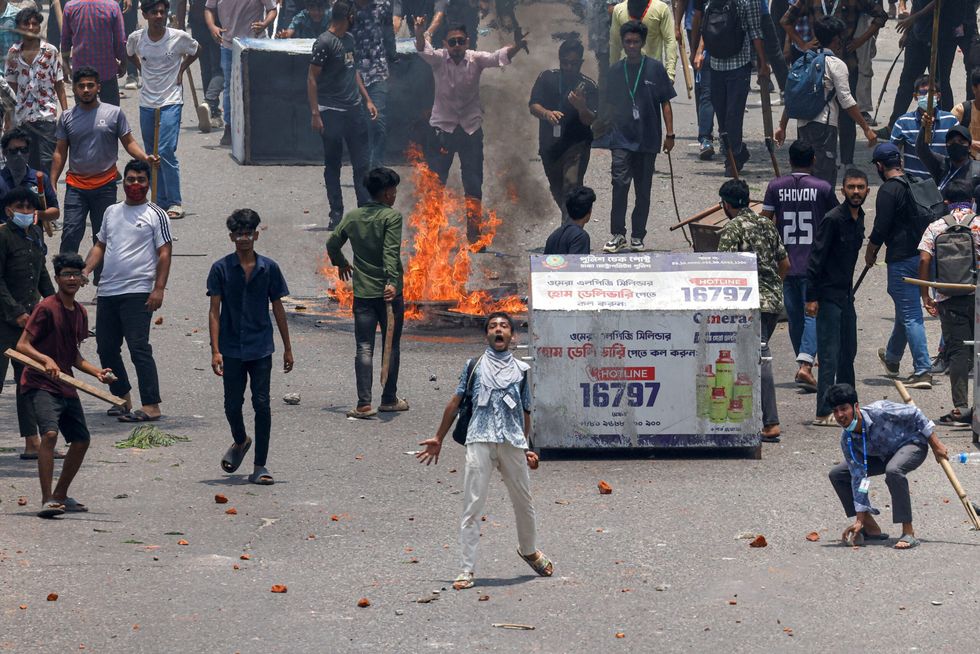 Bangladesh students clash with police, attack TV station