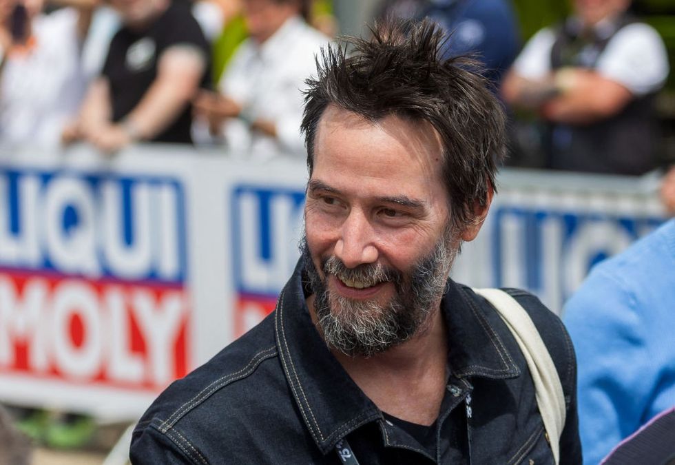 Keanu Reeves escapes injury during pro auto racing debut