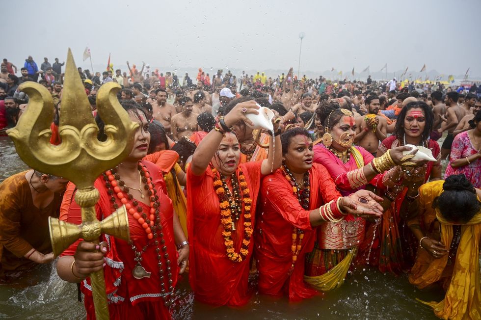 Transgender ascetics from Kinnar Akhara perform 'Amrit Snan' at Maha Kumbh
