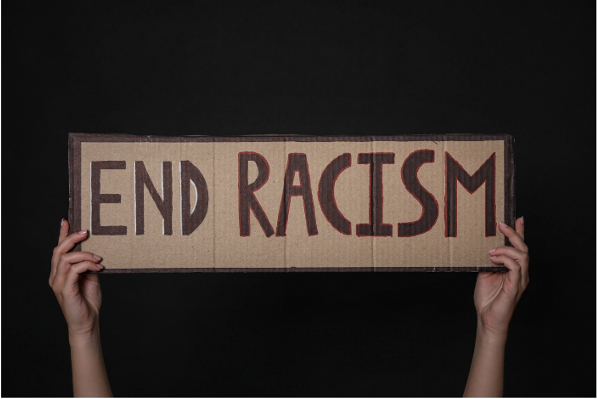 Guardian journalists apologise to former worker for not standing up against racial abuse