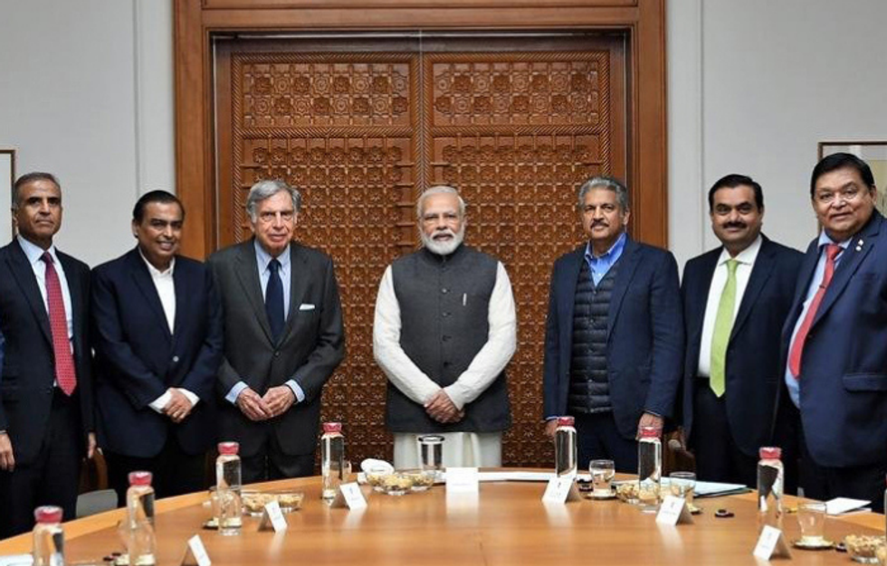 Adani to invest £15b in green energy, takes on Ambani