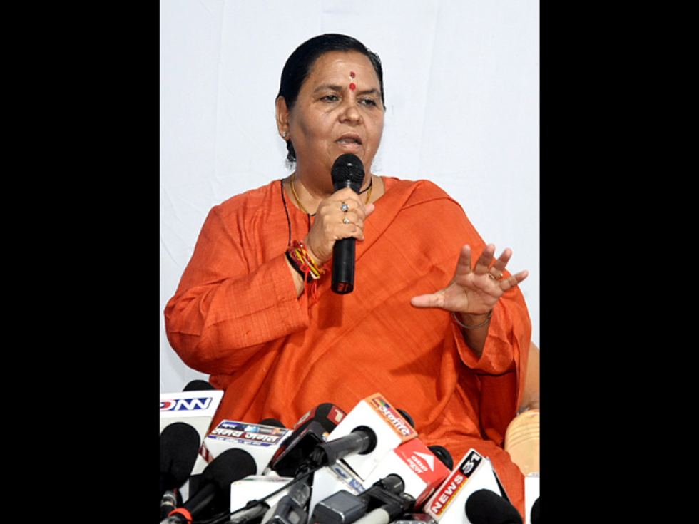 No alcohol in religious town! Leader of Modi's BJP throws cow dung at liquor shop