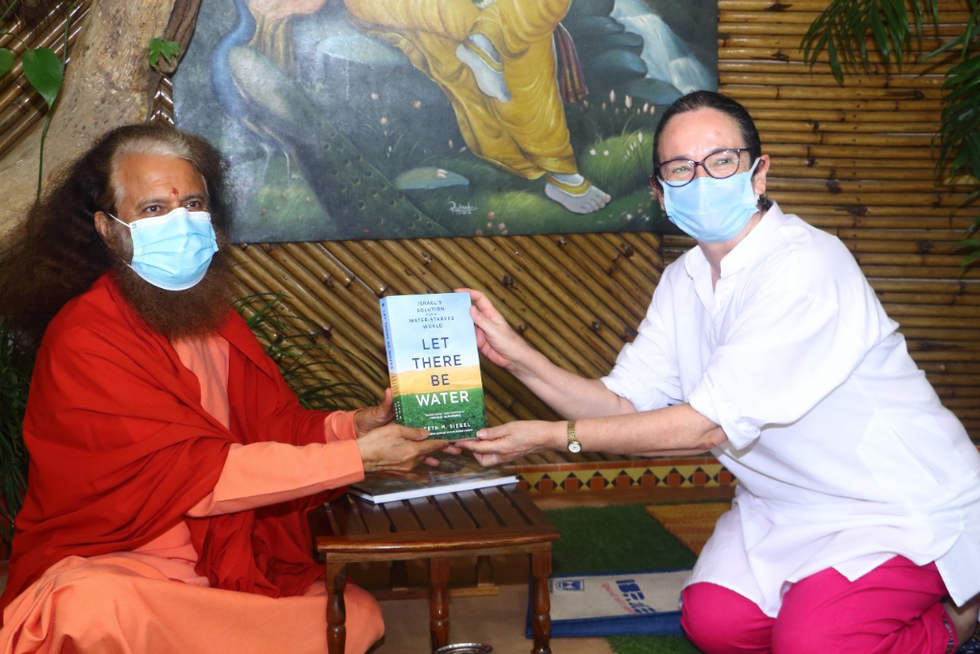 Israel envoy talks water conservation with Parmarth Niketan president