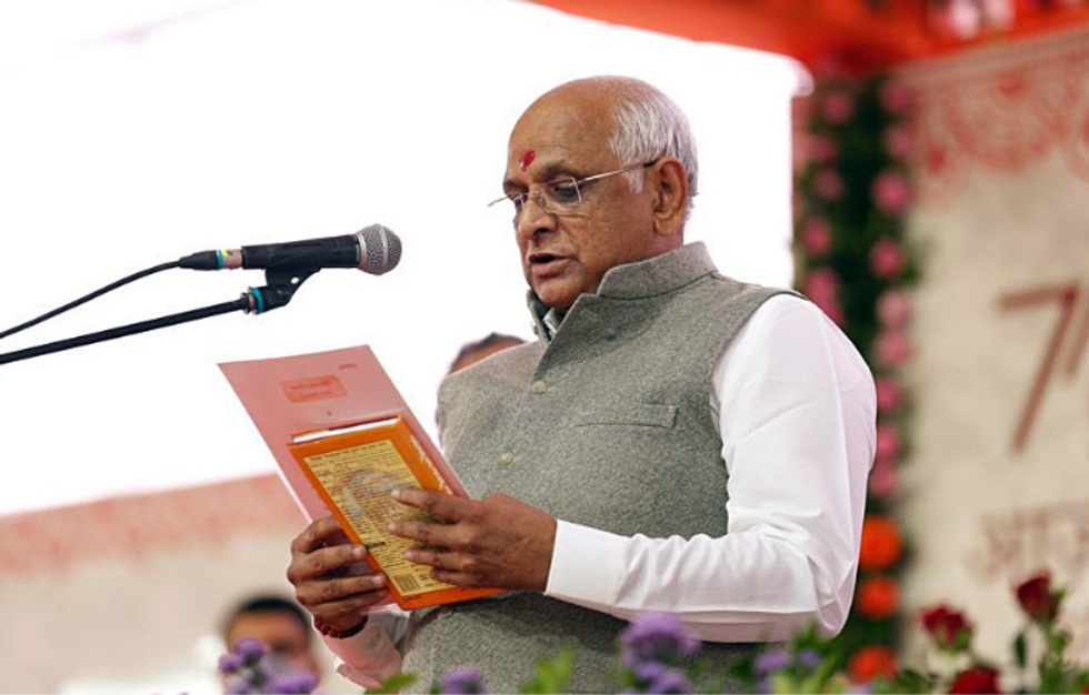 New Gujarat cabinet sworn in despite dissent