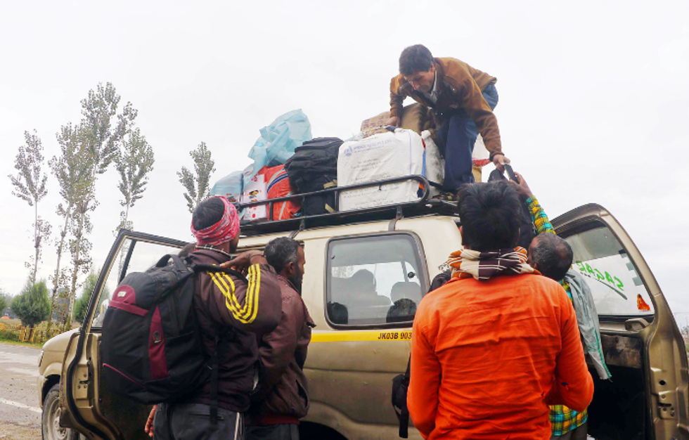 Kashmir: Afraid of terror, migrant workers exit Valley