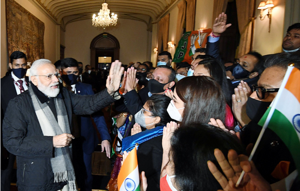 In Glasgow, Modi meets & greets NRIs ahead of COP26