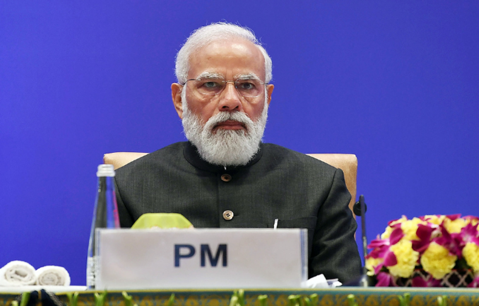Trying our best to bring economic offenders back: Modi