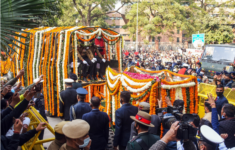 General Bipin Rawat, wife cremated with full military honours