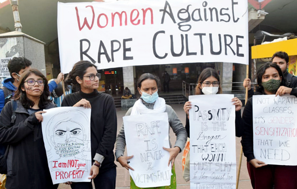 India outraged as woman allegedly gang-raped, paraded in Delhi