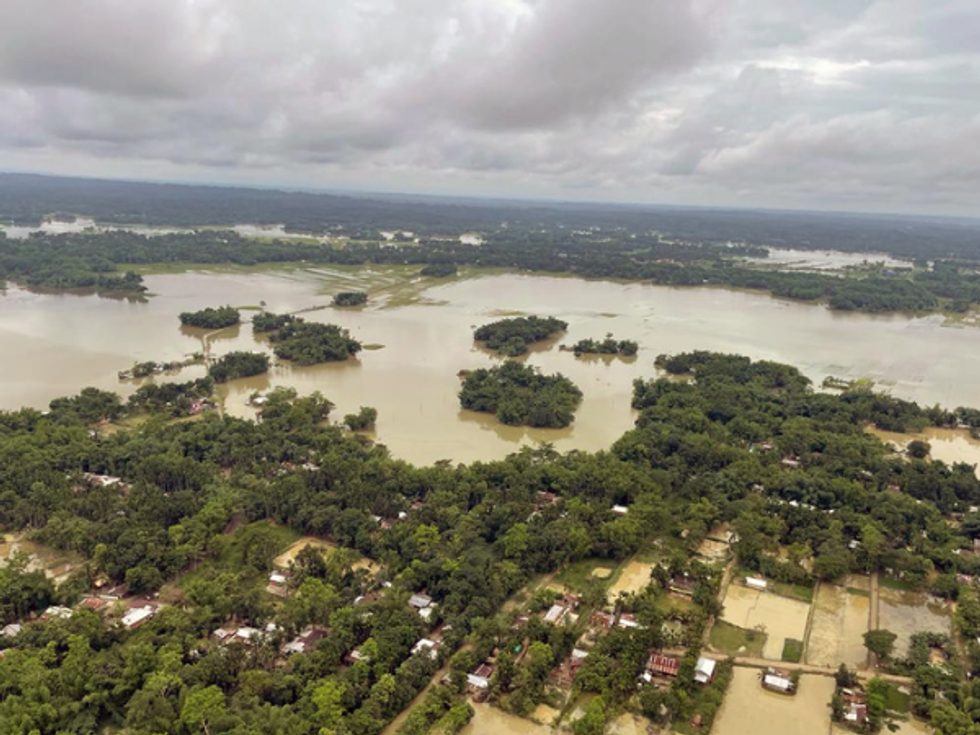 In flood-hit Assam, staff of waterlogged cancer hospital administer chemotherapy on roadside