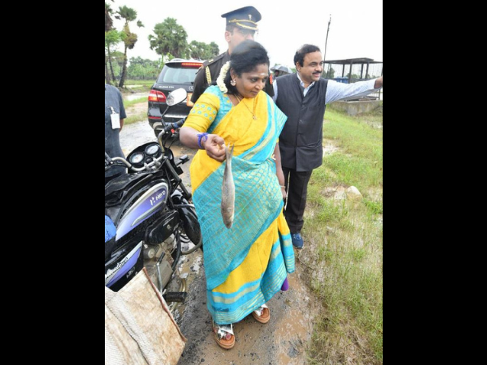 In flood-hit Telangana, top political leaders seen worshipping river, catching fish