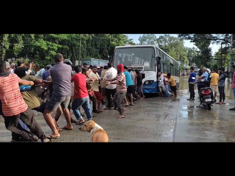 WATCH: Bengaluru's other 'Rath Yatra'; citizens pull bus, broken down under water in heavy rains