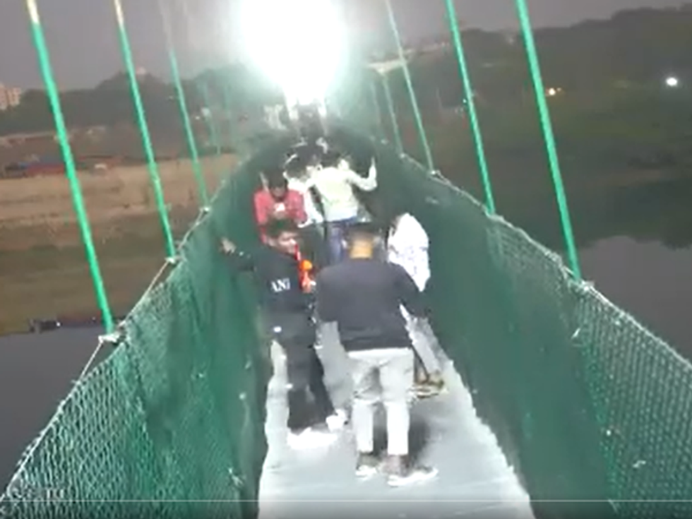 WATCH WITH HORROR: The moment when a crowded bridge in Gujarat collapsed